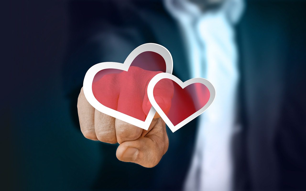 businessman, finger, touch, turn on, love, hearts, humanity, compassion, fairness, affection, switch, switch off, begin, hand, start, button, sign on, actuate, activate, symbols
